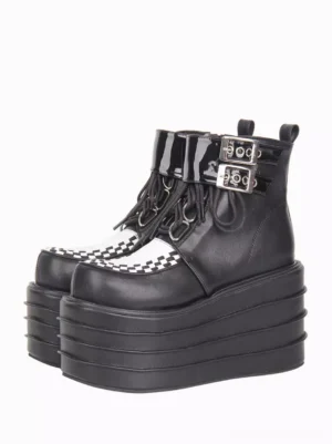 Gothic Lolita platform ankle boots front three-quarter view showing black PU leather with dual metal buckle straps and checkerboard toe cap detail