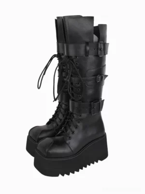 Gothic lolita platform boots black paired front three quarter view with front lace-up straps buckles and jagged platform sole