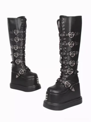 Black gothic lolita platform boots side three-quarter view displaying tall lace-up shaft heart-shaped buckles and elevated wedge platform heel construction