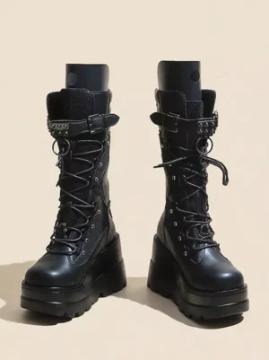 Classic black gothic lolita platform boots with lace-up front closure and metal eyelets displayed in frontal flat view