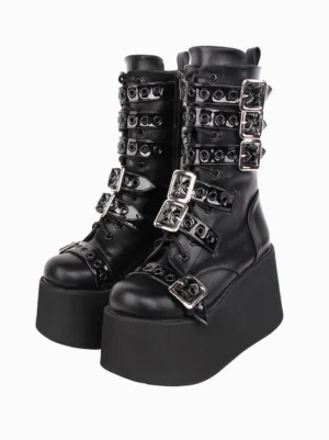 Gothic lolita platform boots in solid black PU leather, front three-quarter paired view, featuring silver metal buckles and eyelet-adorned straps, thick matte platform sole, round toe design, alternative fashion footwear