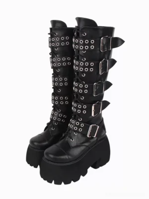 Gothic Lolita platform mid-calf boots with black PU leather, dual oblique front view showing silver grommets, buckle details, and thick serrated sole