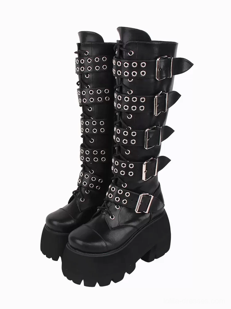 Gothic Lolita platform mid-calf boots with black PU leather, dual oblique front view showing silver grommets, buckle details, and thick serrated sole