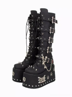 Gothic Lolita black platform knee-high boots with silver rivets buckles and chain details front three-quarter view thick wedge sole