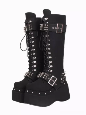 Gothic Lolita black matte PU leather knee-high platform boots with rivets and lace-up front detail, round toe, thick wedge sole, front flat lay view on white background