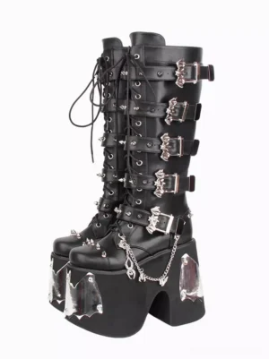 Gothic Lolita black platform knee-high boots with silver buckles and chains oblique front angle detail shot showing bat-shaped sole