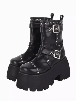 Pair of black gothic lolita platform boots with silver grommets and studded details front three-quarter view chunky lug sole