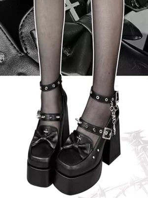 Black gothic punk lolita shoes side profile showing chunky platform heel metal chain ankle strap and studded buckle details