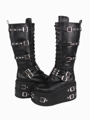 Gothic lolita platform boots black PU leather three-quarter diagonal view showing silver grommets studs wedge heel round toe