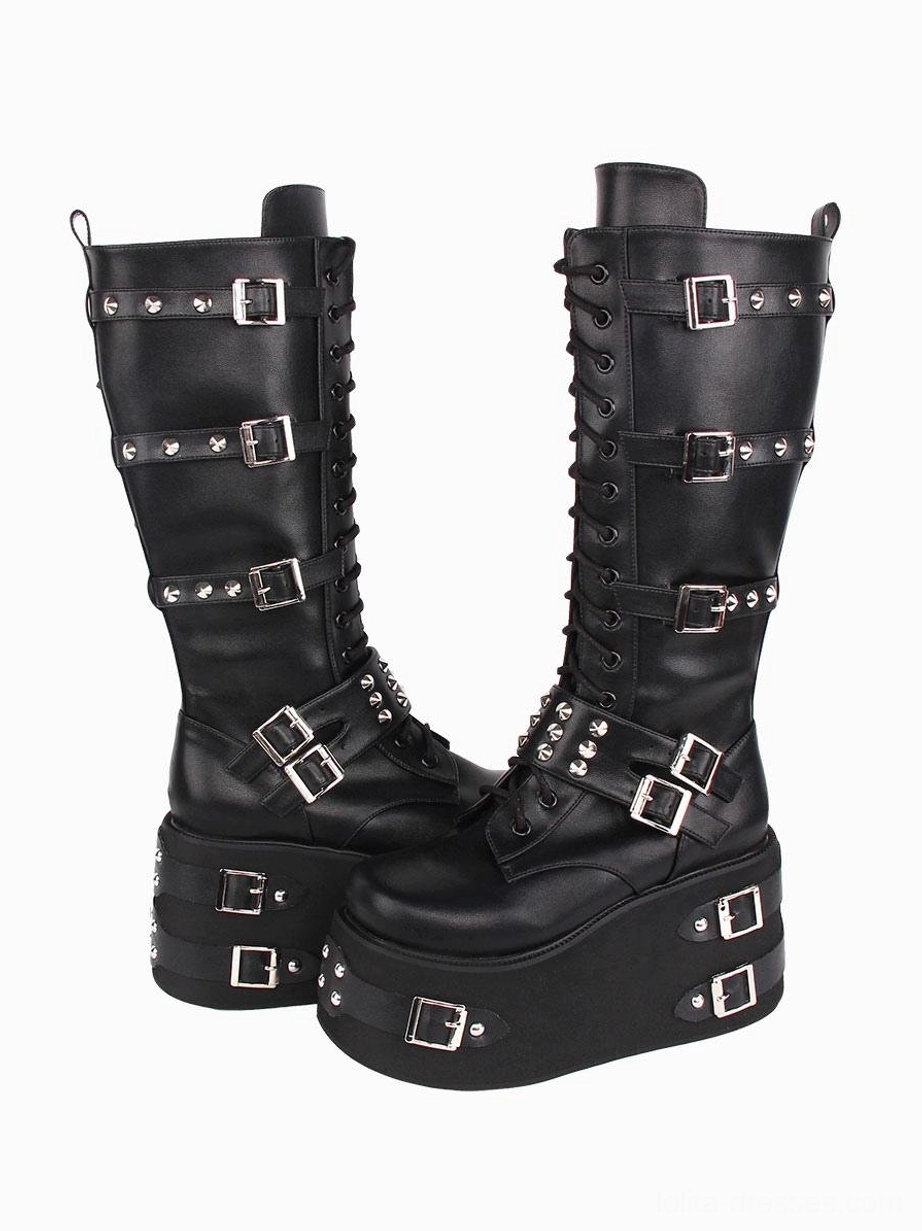 Gothic lolita platform boots black PU leather three-quarter diagonal view showing silver grommets studs wedge heel round toe