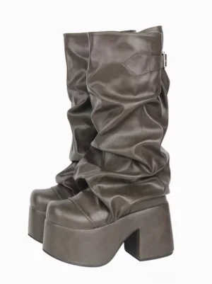 Gothic Lolita platform boots in hunter green PU leather, front three-quarter view showcasing round toe, ruched shaft detail, chunky platform heel, mid-calf height, and decorative collar buckle on white studio background