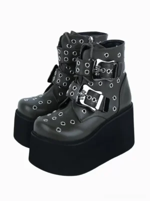Paired hunter green gothic lolita platform boots with silver grommets and dual metal buckle straps, front three-quarter view on white background