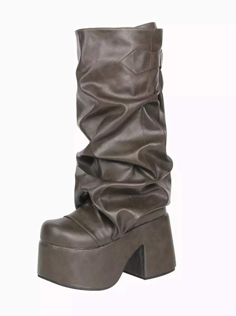Single Gothic Lolita platform boot in hunter green, right three-quarter side view displaying thick platform sole, slouched leather shaft texture, ruched details, mid-calf height, chunky heel profile on white studio background