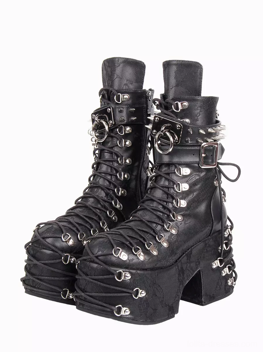 Gothic lolita platform boots with silver metallic grommets and round toe design displayed on white background front view