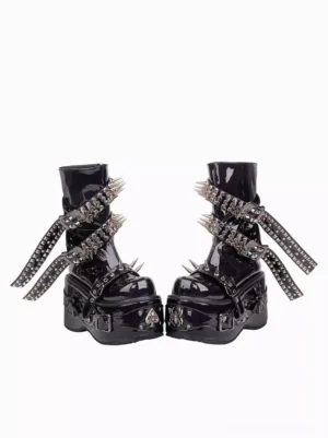 Pair of Gothic Lolita platform boots frontal display featuring studded buckle straps, spiked metal hardware, and aggressive gothic styling details