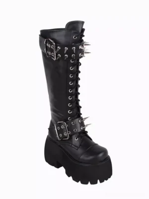 Single Gothic Lolita platform boot left side front angle showing patent leather round toe silver spike straps and lace-up fastener details