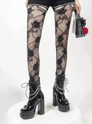 Gothic lolita boots styled with rose pattern black fishnet stockings and black lace skirt overhead partial view showing chain embellishments