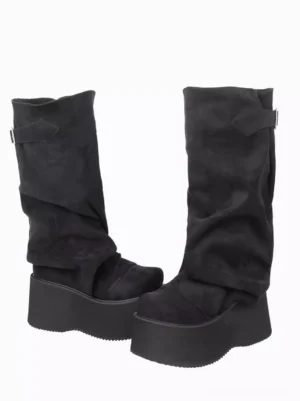 Black gothic lolita platform boots side oblique view displaying slouchy mid-calf shaft, rounded toe, matte corduroy finish, and adjustable side buckle detail