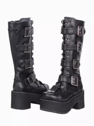 Pair of black Gothic Lolita platform boots side three-quarter angle showing buckle straps thick chunky platform heel and smooth PU leather