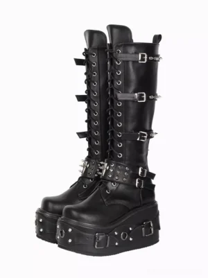 Gothic Lolita platform boots front three-quarter view showing black studded buckle straps and wedge heel design on white background