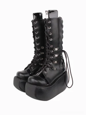 Gothic Lolita platform boots front three-quarter view showing two-tone PU leather with metal grommets and front lace-up design thick platform sole