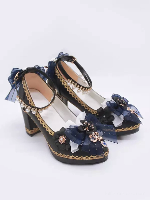 Back three-quarter view Gothic Lolita platform heels showing dark blue mesh bow decorations chunky block heel inner sole construction and black base with golden edge trim