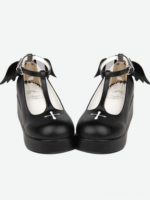 Gothic Lolita platform Mary Jane shoes demonic wing heel decoration detail close-up ornamental cross motif artistic design