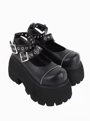 Gothic Lolita platform Mary Jane shoes side profile view showcasing dual buckle strap hardware metallic grommets and substantial serrated platform wedge heel