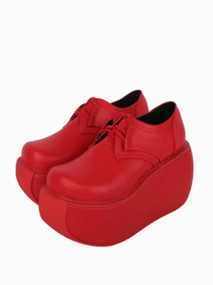 Red Gothic Lolita platform pumps front three-quarter view showcasing smooth PU leather upper with metallic sheen round toe design and authentic lace-up closure system