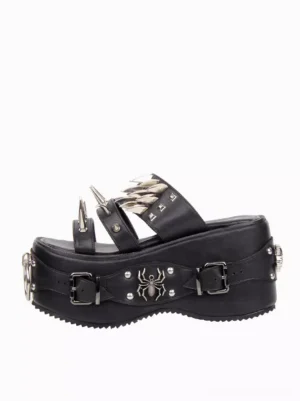 Single black gothic lolita platform sandal left side three-quarter angle showing adjustable buckle strap and silver spike details