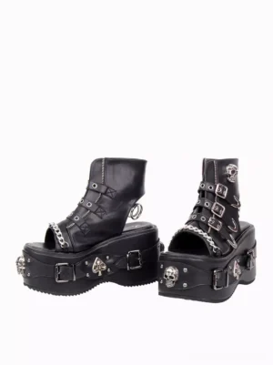 Black gothic lolita sandals with ankle zipper and spade hardware platform design side rear view showing stud details