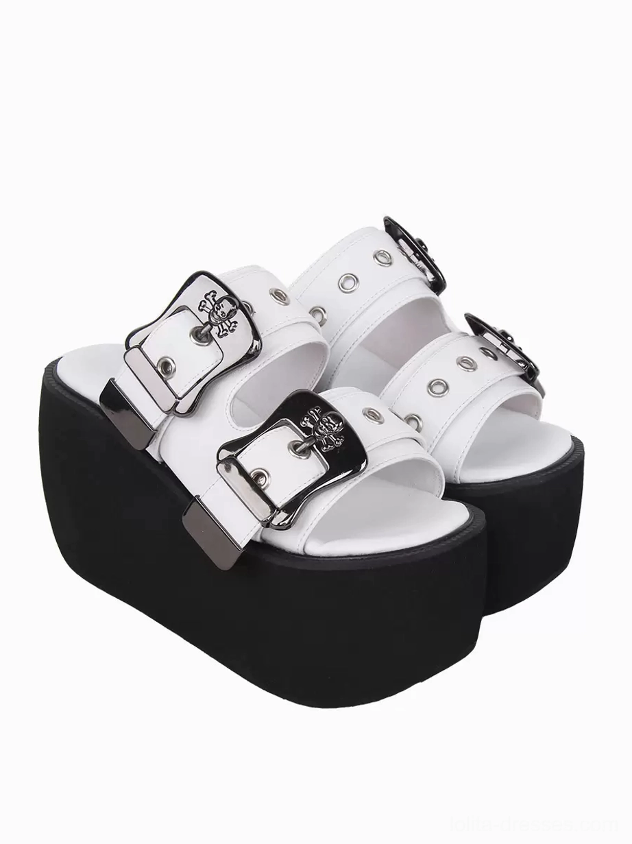 Paired white gothic lolita platform sandals back three-quarter view showing strap eyelet details silver hardware thick black wedge sole construction
