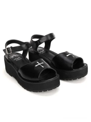 Pair of black gothic lolita platform sandals side oblique view showcasing thick wedge sole, branded inner insole, and overall silhouette on white background
