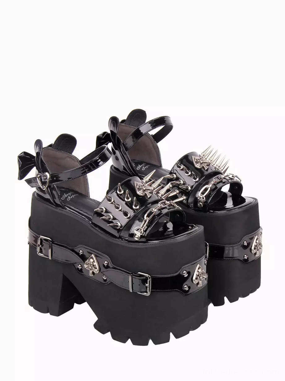 Gothic lolita summer sandals side three-quarter view featuring silver chain decorations, spike details, heart-shaped ankle buckle, and chunky block wedge heel in black leather
