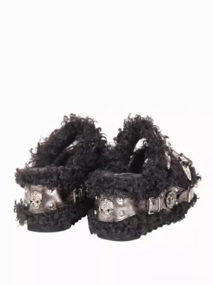 Black gothic lolita sandals rear three-quarter angle view skull embossed metal hardware fuzzy trim detail