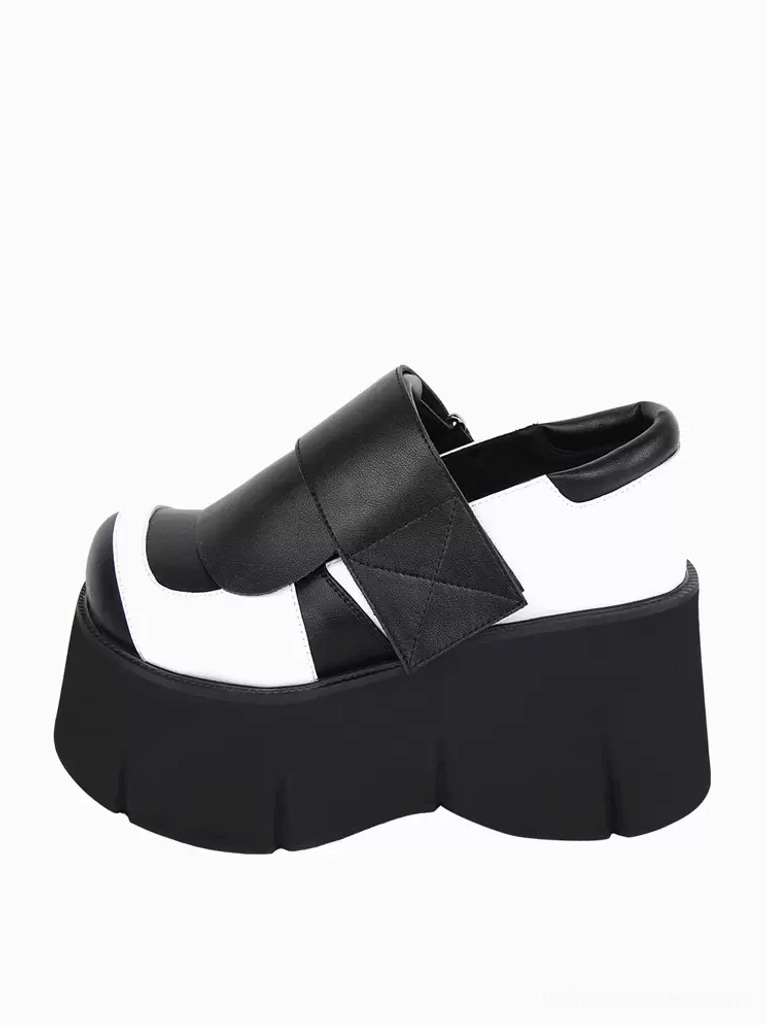 Gothic Lolita platform shoe single side view displaying rear zipper detail, thick flatform sole, and black-white color blocking on right profile