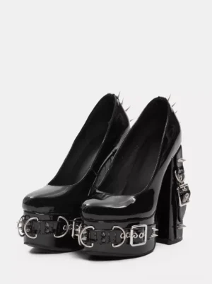 Black patent leather gothic lolita platform shoes with silver rivets and grommets front view static display
