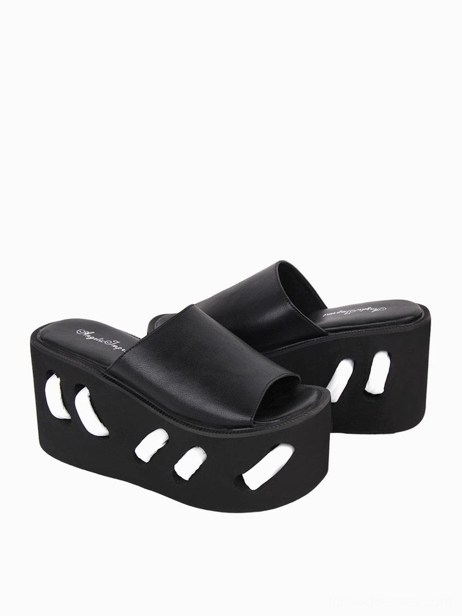 Black gothic lolita platform sandals rear three-quarter view revealing hollow cutout wedge sole branded footbed and open toe heel area design