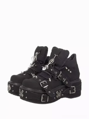 Gothic Lolita black platform wedge shoes with silver buckles and spider metal charms, front oblique view showing round toe design and rivet embellishments
