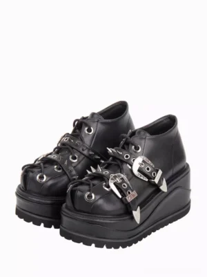 Black Gothic Lolita platform wedge shoes with silver spike buckles front three-quarter view on white background showing round toe and decorative rivets