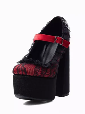 Single Gothic Lolita platform pump front three-quarter angle showcasing red decorative buckle strap, black lace trim details, round toe and substantial platform heel construction