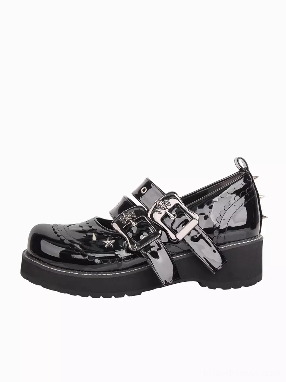 Single black gothic lolita pump shoe side profile view displaying spike stud embellishments on chunky block heel, adjustable buckle strap, and patent leather construction against white background