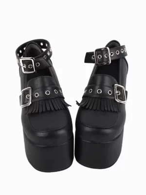 Front three-quarter view of gothic lolita platform wedge pumps displaying dual silver buckles on vamp and ankle strap thick platform sole black polyurethane leather