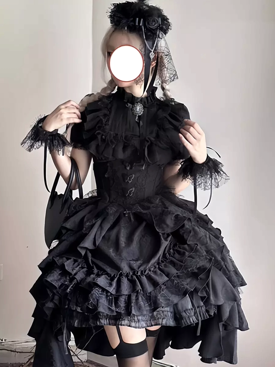 Gothic lolita pure black two-piece outfit featuring black jacquard blouse and black tiered ruffled skirt with lace embellishments for elegant dark aesthetic