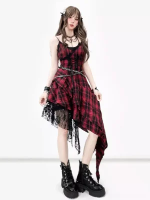 Full body front view of gothic lolita plaid corset JSK dress with asymmetrical hem and lace underlayer worn with platform boots