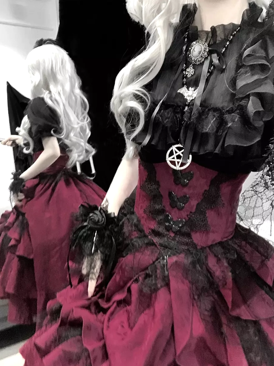 Gothic lolita dress set close-up and back partial view highlighting ruffled lace collar, jacquard fabric texture, corset-style waist cinching, and pentagram pendant accessory details