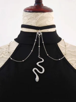 Silver snake pendant choker with beaded chain design displayed on black halter lace dress, front close-up detail shot showing intricate metalwork and neck strap