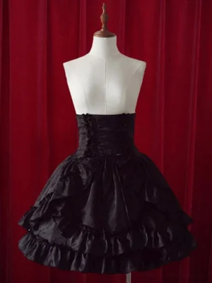 Gothic lolita high-waisted skirt displayed on dress form showing corset-style waist and detailed ruffled hem trim from frontal angle