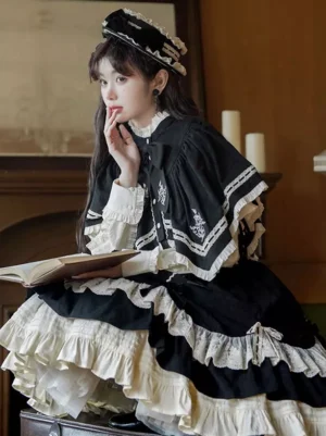 Gothic Lolita skirt with embroidered cape and tiered ruffled lace layers - side coordinate view