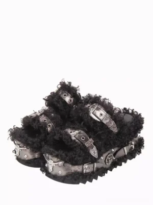Gothic lolita platform sandals front three-quarter view black curly faux fur trim silver metal skull grommets buckle straps